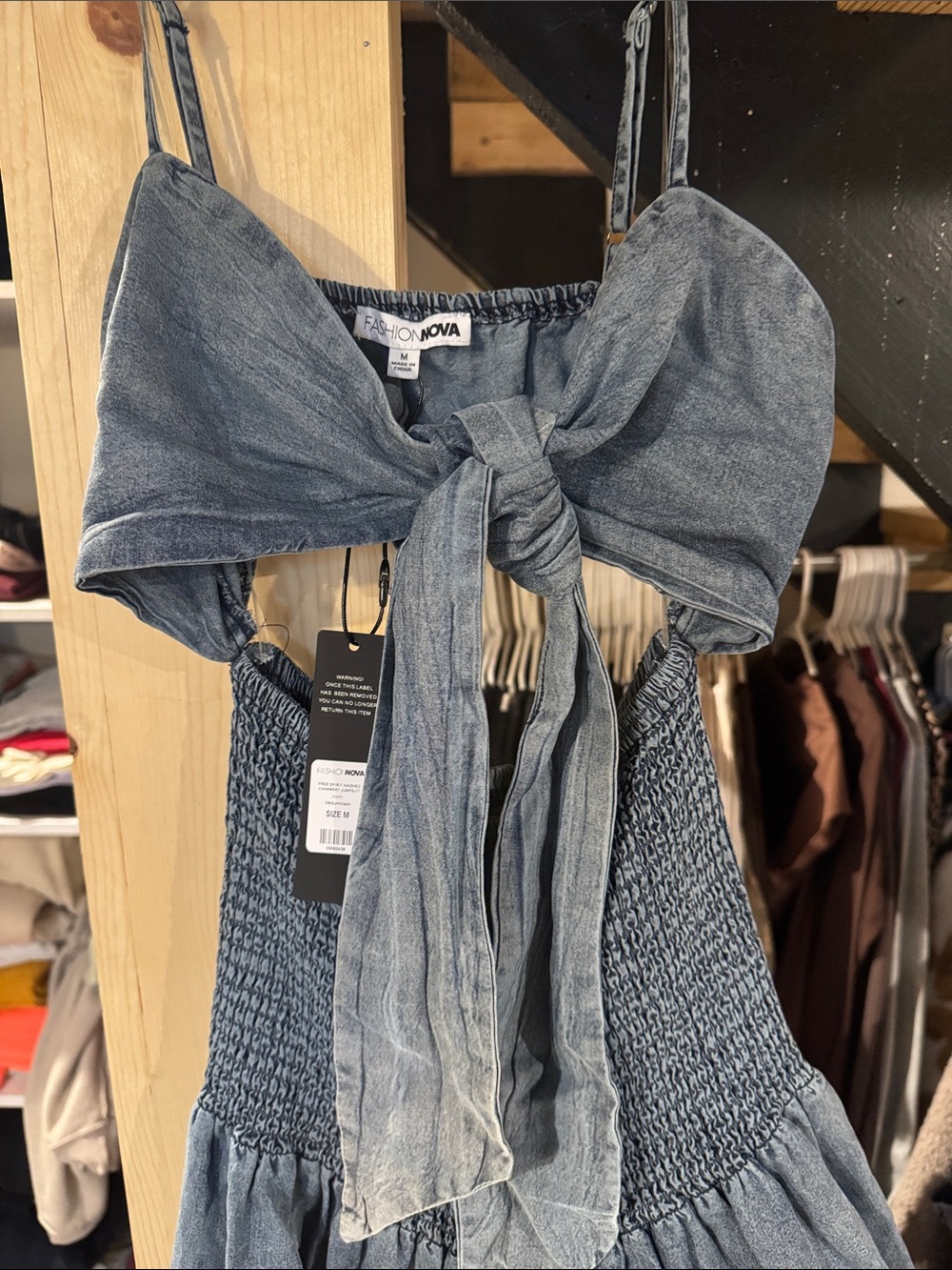 Fashion Nova Blue Chambray Smocked Jumpsuit with Tie Detail - Picture 3 of 3